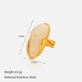 Detailed macro view of an oval stainless steel ring with white marble texture stone - Creamy White Marble Pattern (Ring)
