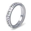 Macro detail of silver ring featuring channel-set square-cut zircon stones on band - US 7 / Steel