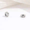 Close-up of S925 sterling silver spacer beads with vintage ethnic patterns for DIY jewelry - Ancient Character Relief Style (Model G)