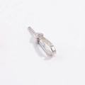 Macro shot of S925 sterling silver pearl pendant clasp connector for DIY jewelry - White Gold V-Shape Style