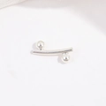 Detailed macro view of S925 sterling silver bamboo joint tube and polished round beads - Small Curved Tube with Beads / Silver