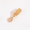 Macro shot of gold floral charm bead with cubic zirconia drop for DIY jewelry making - Zirconia Water Drop Lace Bead / Gold