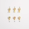 Detail view of S925 silver gold-plated flower pendants with colorful inlaid gemstones - Pave Clover Style - Clear Stone (SK5-01)