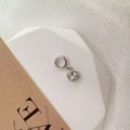 Macro shot of S925 sterling silver charm featuring a brilliant-cut white cubic zirconia - Style L