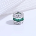 Macro detail of S925 sterling silver barrel bead with emerald and zircon pavé setting - Platinum Green Zirconia Barrel Bead