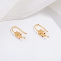 Detailed close-up of S925 silver willow leaf ear hooks with red zircon accents - Gold Willow Leaf Style With Fuchsia Zirconia
