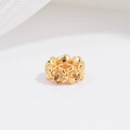 Detalle de la pieza espaciadora de flor hueca en plata S925 dorada para joyería - 6,9mm / Dorado