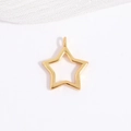 Macro detail of a hollow star-shaped gold pendant with integrated loop for DIY jewelry - Gold Small Star Pendant