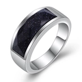 Polished stainless steel ring with rectangular blue sandstone inlay in 45-degree angle view - US 7 / Blue