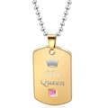 Detail of His Queen gold dog tag necklace with crown motif and pink gemstone inlay - His Queen / Gold