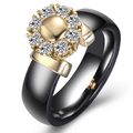 6mm black ceramic ring featuring a golden petal floral design with sparkling crystals - US 6 / Gold + Black