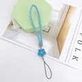Close-up of blue braided leather phone strap with enamel flower charm and crystal center - Woven Rope Small Flower Blue (K6157)