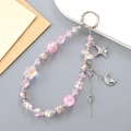 Pink iridescent crystal star bead phone charm with silver moon and star metal pendants - Pink