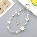 Y2K style beaded phone strap with candy color four-leaf clover and butterfly charms - White Butterfly Clover (K4805)