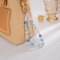 Luxus Blumen Quasten Anhänger mit blau gestuften Perlen an brauner Ledertasche - Blau