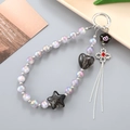 Purple beaded phone strap with black rose, red gem flower pendant and metal tassels - Black Star Charm (K4946)