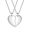 Polished stainless steel heart puzzle necklace for couples on a white background - Silver Set