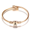 Roségouden gedraaide kabelarmband met een gepolijste hartbedel en gegraveerde letter A - Initiaal A