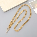 Detailed close-up of shiny gold metal chain strap with polished lobster clasp and ring - Gold (Square O-Chain)