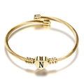 Gouden roestvrijstalen kabelarmband met hartvormige hanger en gegraveerde letter N - Letter N