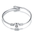 Bracciale rigido a cavo intrecciato con ciondolo a cuore lucido e lettera O - Lettera O (Dado O)