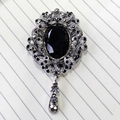Retro zinc alloy brooch with black oval gemstone and dangling teardrop charm detail - Ancient Silver Black Gem (D1340)