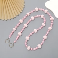 Pink beaded crossbody strap with fluffy pompom and floral accents for phone cases - Plush Ball Crossbody Chain (K2763)