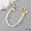 Baroque pearl phone lanyard with clover beads and heart-shaped 'To you' gold charm - Crystal Clover Handheld Chain (K3260)