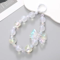 Iridescent bow and heart bead phone charm with a white spring ring clasp on a purple base - K366 Mermaid Bow Pendant (White)