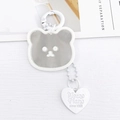 Portachiavi orsetto bianco con ciondolo a cuore specchiato e chiusura in metallo bianco - Ciondolo / Bianco