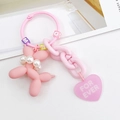 Roze mat ballonhond sleutelhanger met parelketting en hartvormige bedel voor tassen - Roze