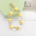 Handgemachter Perlen-Schlüsselanhänger mit gelbem Smiley und goldenem Drehverschluss-Karabiner - Smiley Anhänger (K1060)