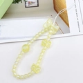 Detail of yellow beaded phone strap featuring cute resin bears and a decorative bow - Phone Chain / Yellow (K1684)