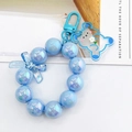 Portachiavi orsetto blu perla sirena con perle perlate e fiocco azzurro traslucido - Ciondolo / Blu
