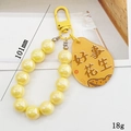 Yellow mermaid pearl keychain with double-sided acrylic tag and metal hook 101mm 18g - Yellow (Good Luck)
