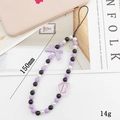 Dragonne de téléphone perlée avec nœud violet et breloque cœur sur bureau - Style Nœud Violet (K1801)