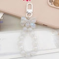 Iridescent beaded keychain with a white bow and metal clasp for phone cases - White