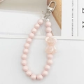 Ciondolo per telefono in perle acriliche rosa con orsetto in resina e chiusura argento - Rosa