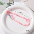 Correa rosa de cuentas para móvil con colgantes de tulipán y caramelos en plato blanco - Estilo Tulipan y Caramelo - Rosa (K1857)