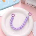 Detail of purple faceted heart beaded strap with dual metal spring rings for phone cases - Purple (K1867)