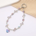 Iridescent beaded phone charm with butterfly and heart pendant in dreamlike purple and blue - Iridescent Butterfly Heart Charm-Purple (K4450)
