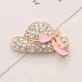 Detailed close-up of a crystal-studded straw hat charm with a pink bow decoration - Gold Base Pink Hat (D1978)