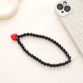 Detail of a phone lanyard with round black beads and a 3D red heart-shaped pendant - Large Red Heart Pendant Style (K635)