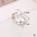 Vista dettagliata di uno strass in vetro ovale con castone in metallo da 1,4x1cm - C424-10*14 Ovale Incastonatura a Griffe