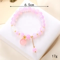 Elegant beaded bracelet in soft pink frosted finish with gold spacers and spherical pendant - Pink Glaze + Pink Bead Charm (K3620)