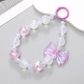Pink and white beaded phone charm featuring a bow pendant and holographic beads - Mermaid Bowknot Charm Purple (K363)