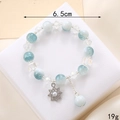 Elegant beaded crystal bracelet with blue moonstone beads and star charm, 6.5cm diameter - Blue White Crackle + Star Charm (K3634)