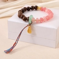 Elegant beaded crystal bracelet with wood beads, pink crackle stones and a gold gourd charm - Pink Crystal Zen Wood Style (K4246)