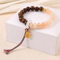 Retro beaded bracelet with wooden beads, orange stones, and golden gourd charm with tassel - Yellow Crystal Zen Wood Style (K4247)