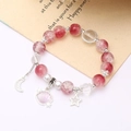 Pink beaded bracelet featuring moon and shell charms with shiny strawberry quartz beads - Shell Crackle Bead Rose Red (K4431)